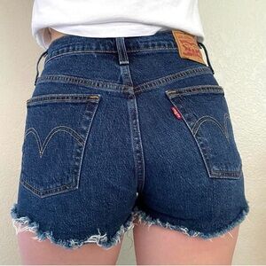 Levi’s 501 women’s Cut off button fly jean shorts Raw hem Size 25 Dark wash